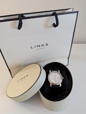 Links of London women's stainless steel watch with black leather straps